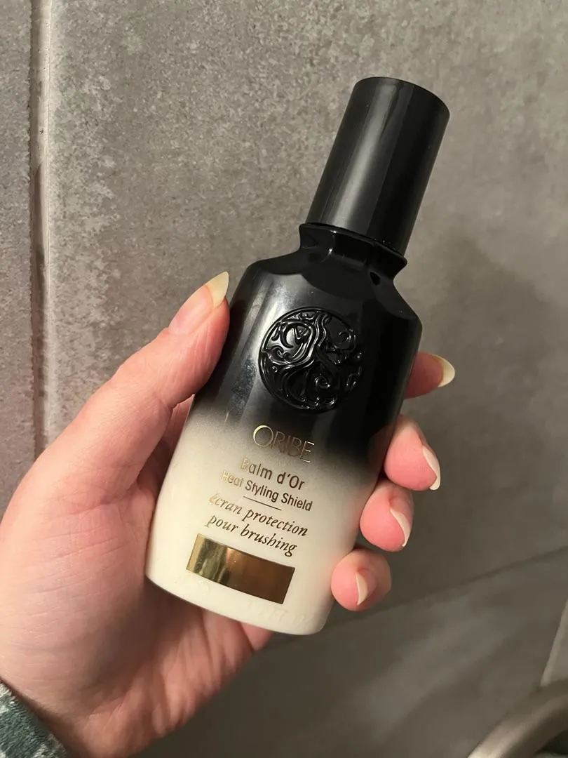 Oribe Balm d’Or Heat Styling Shield hittebeschermer standaard glad