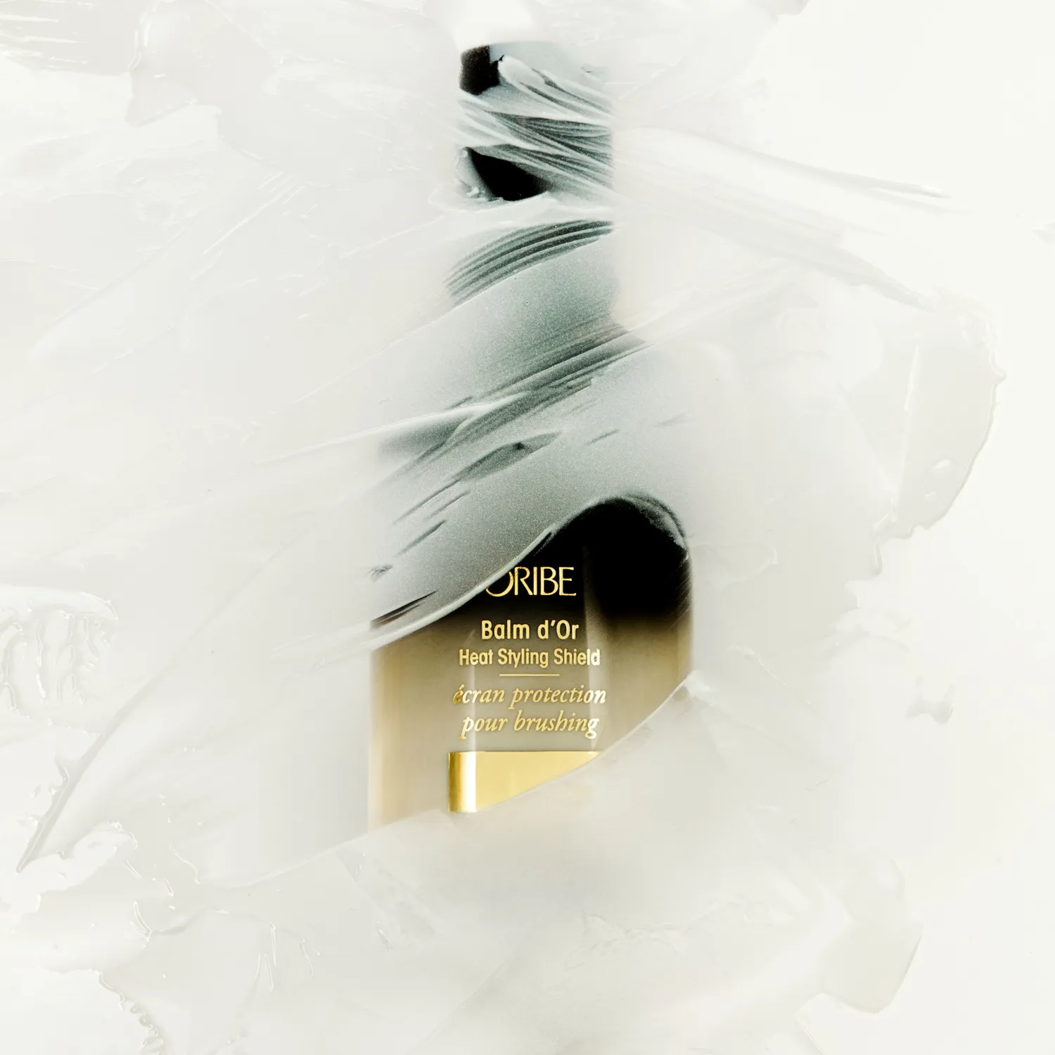 Oribe Balm d’Or Heat Styling Shield hittebeschermer standaard glad