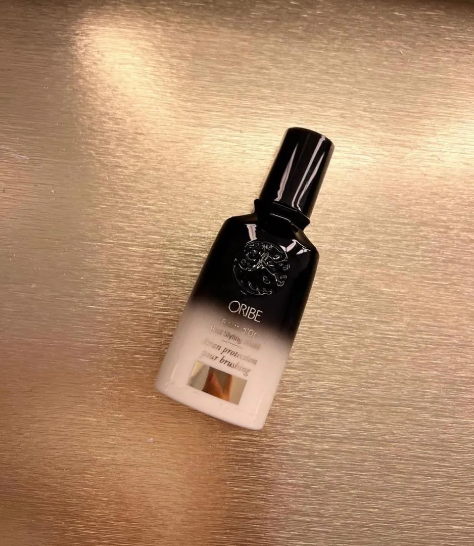 Oribe Balm d’Or Heat Styling Shield hittebeschermer standaard glad