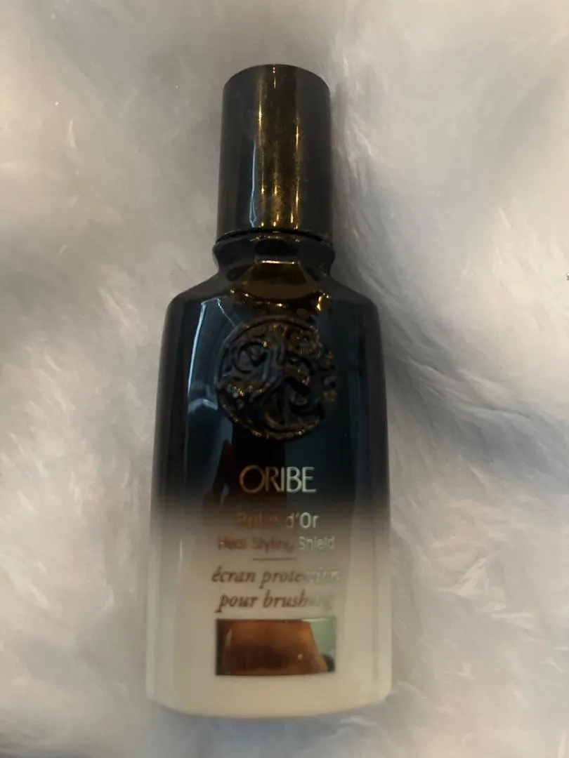 Oribe Balm d’Or Heat Styling Shield hittebeschermer standaard glad