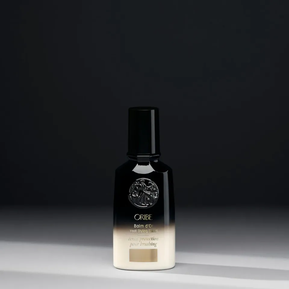 Oribe Balm d’Or Heat Styling Shield hittebeschermer standaard glad