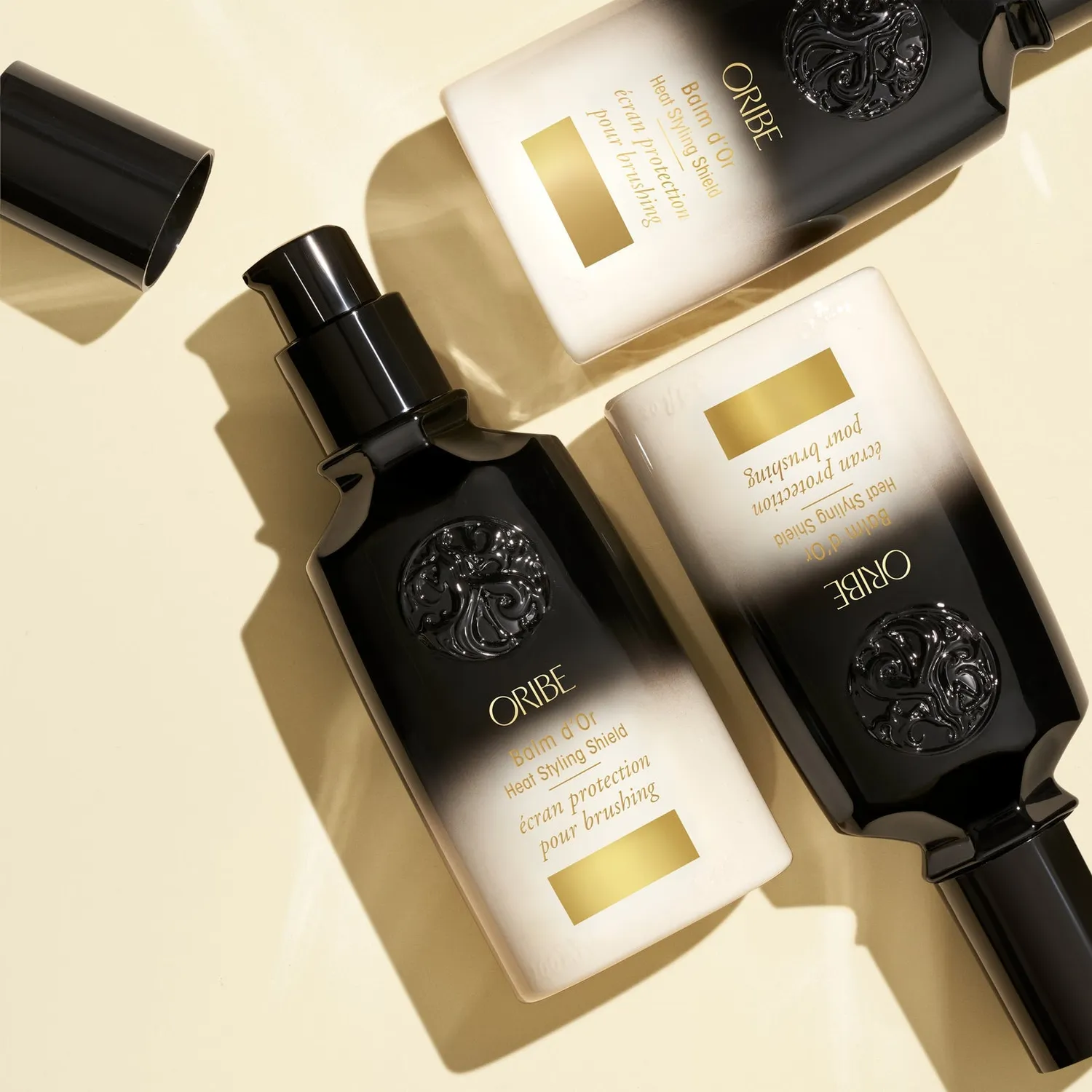 Oribe Balm d’Or Heat Styling Shield hittebeschermer standaard glad