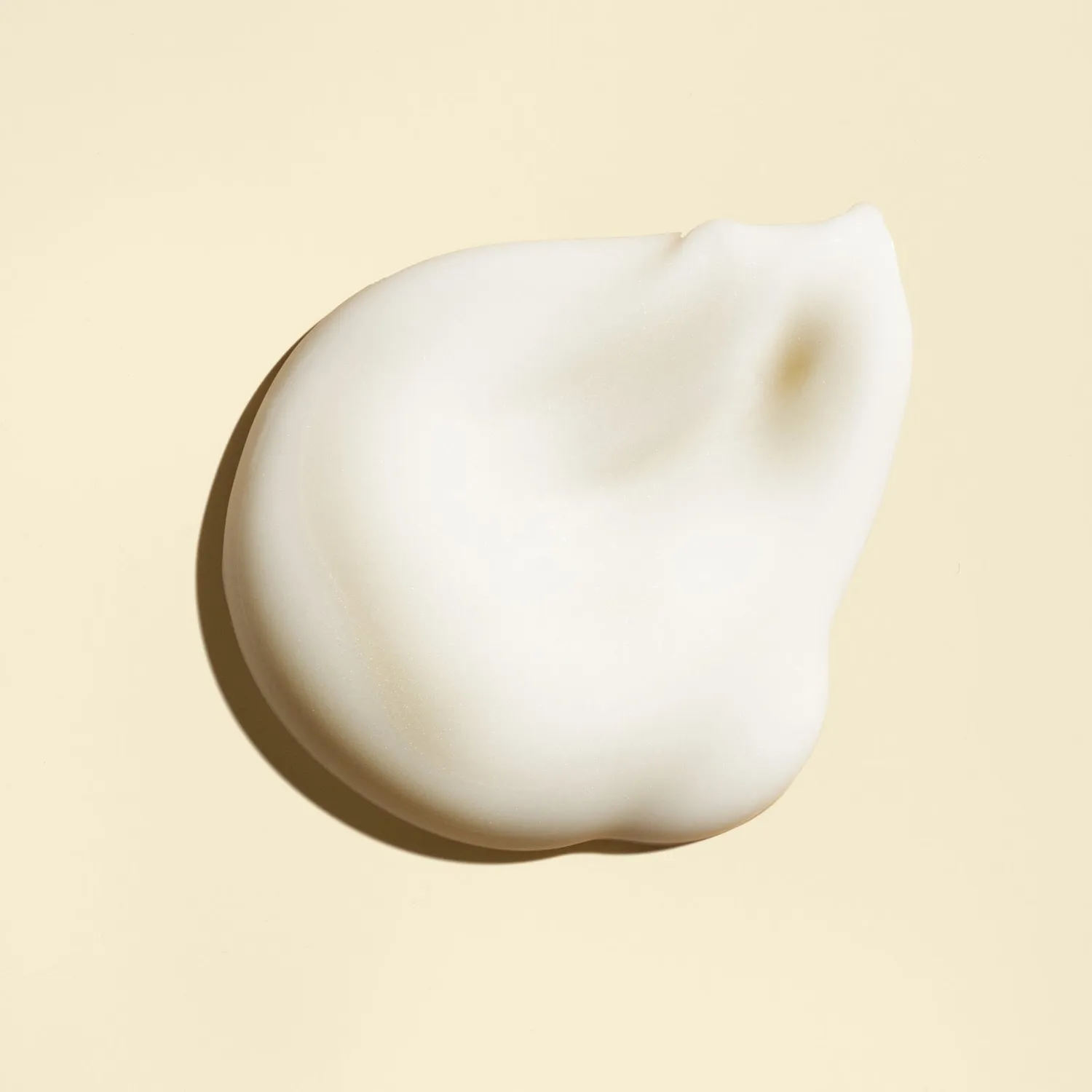 Oribe Balm d’Or Heat Styling Shield hittebeschermer standaard glad