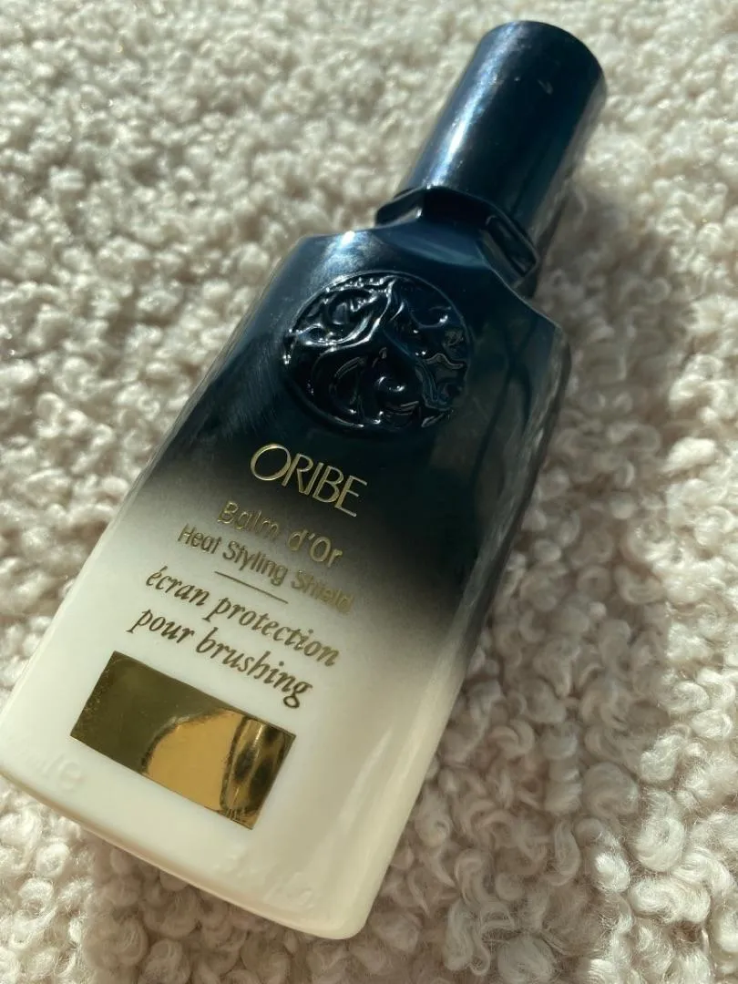 Oribe Balm d’Or Heat Styling Shield hittebeschermer standaard glad