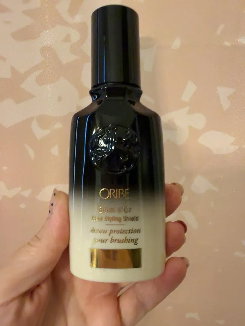 Oribe Balm d’Or Heat Styling Shield hittebeschermer standaard glad